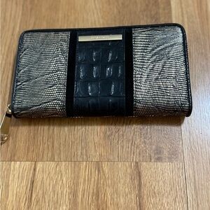 USED normal wear but great condition.Brahmin Black & gold Wallet Textured Design